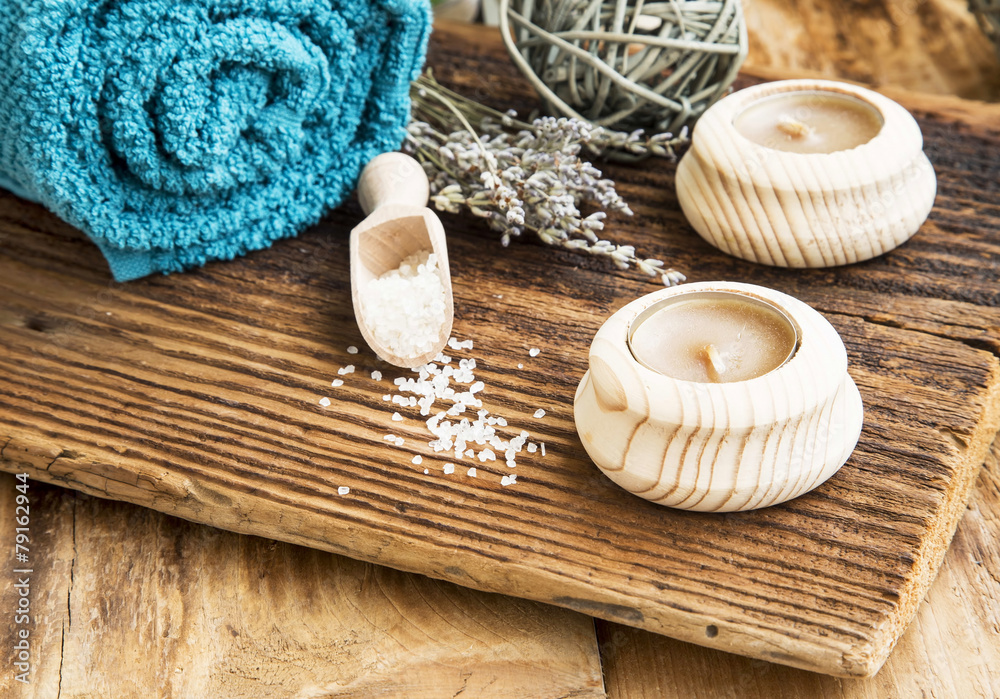 Spa and Wellness Setting on Wooden Background with Candles and L Spa and Wellness Setting on Wooden Background with Candles and L