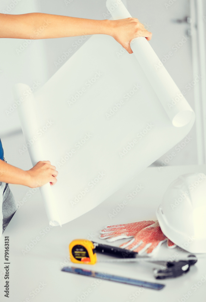 architect with blank blueprint