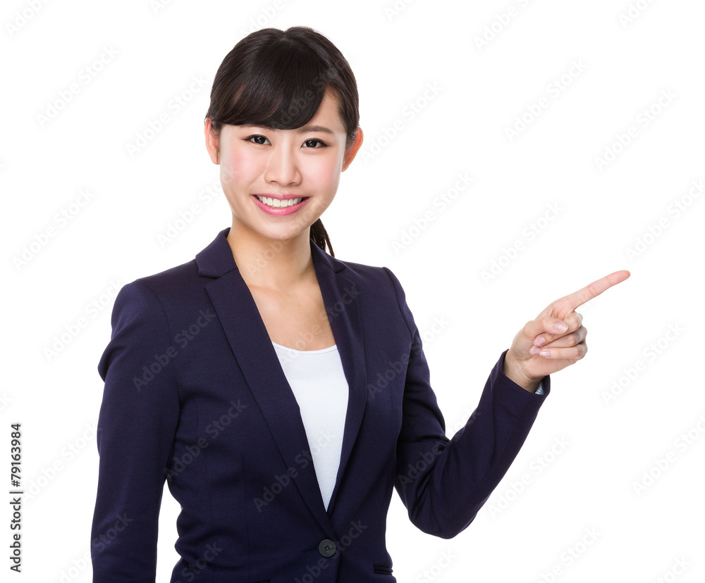 Young businesswoman with finger point up Young businesswoman with finger point up