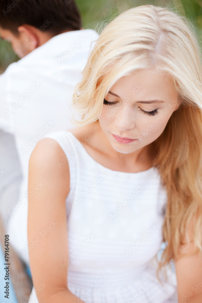 stressed woman with man outside stressed woman with man outside