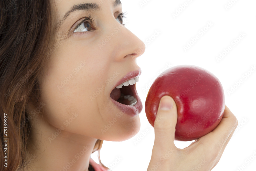 Close up of woman eating an apple Close up of woman eating an apple