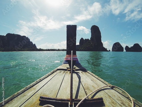 long tailed boat tour around island photo