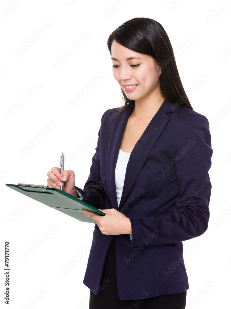 Business woman write on clipboard Business woman write on clipboard
