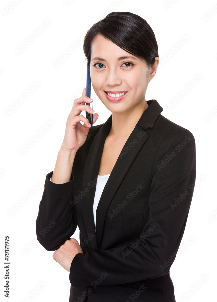 Businesswoman talk to mobile phone Businesswoman talk to mobile phone