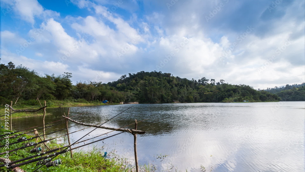 The row of hook place for fishing at reservoir with passing clou