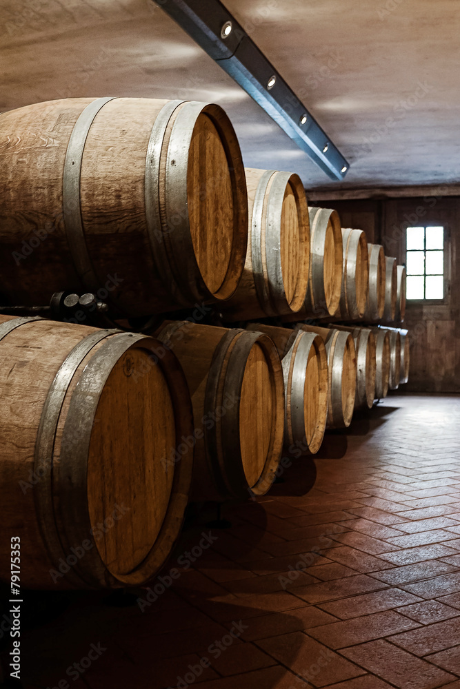 Oak barrels in the cellar. Winery	
