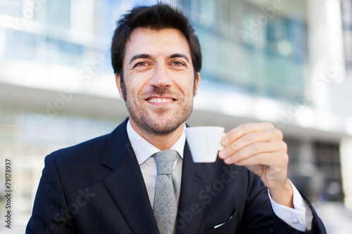 Portrait of a businessman drinking a coffee