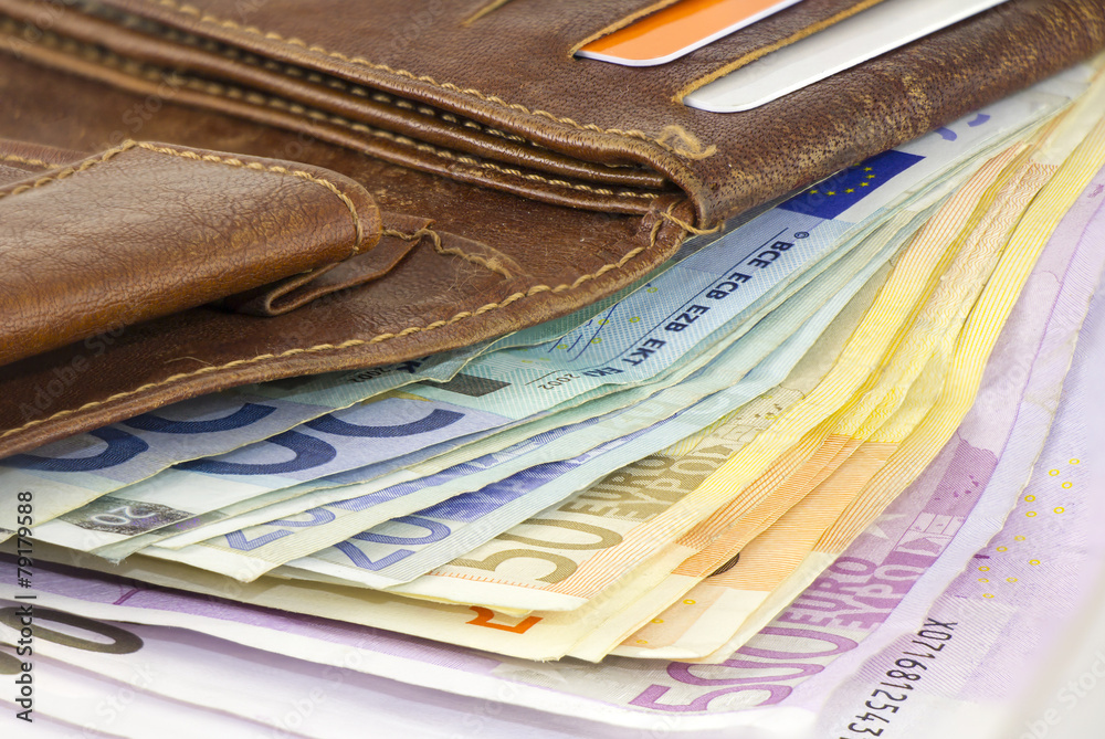 Leather wallet full of Euro banknotes Leather wallet full of Euro banknotes