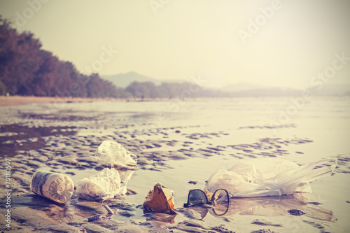 Retro stylized picture of garbage on a beach.