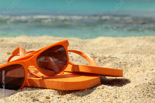 flip flops and sun glasses