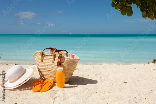 Fototapeta Naklejka Na Ścianę i Meble -  beach gear on whita sand