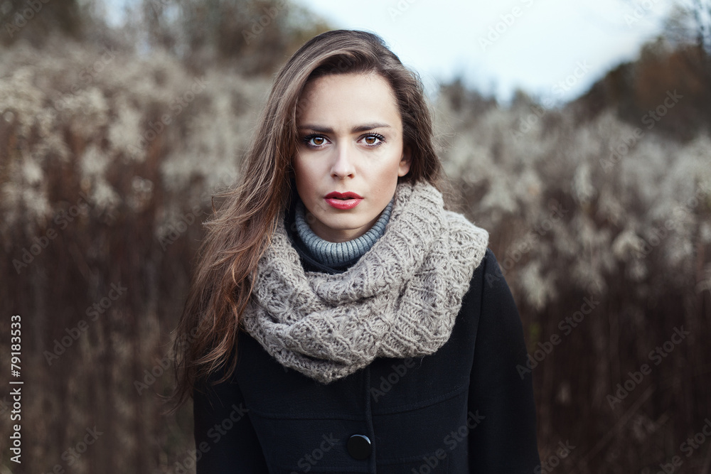 beautiful european girl in autumn field