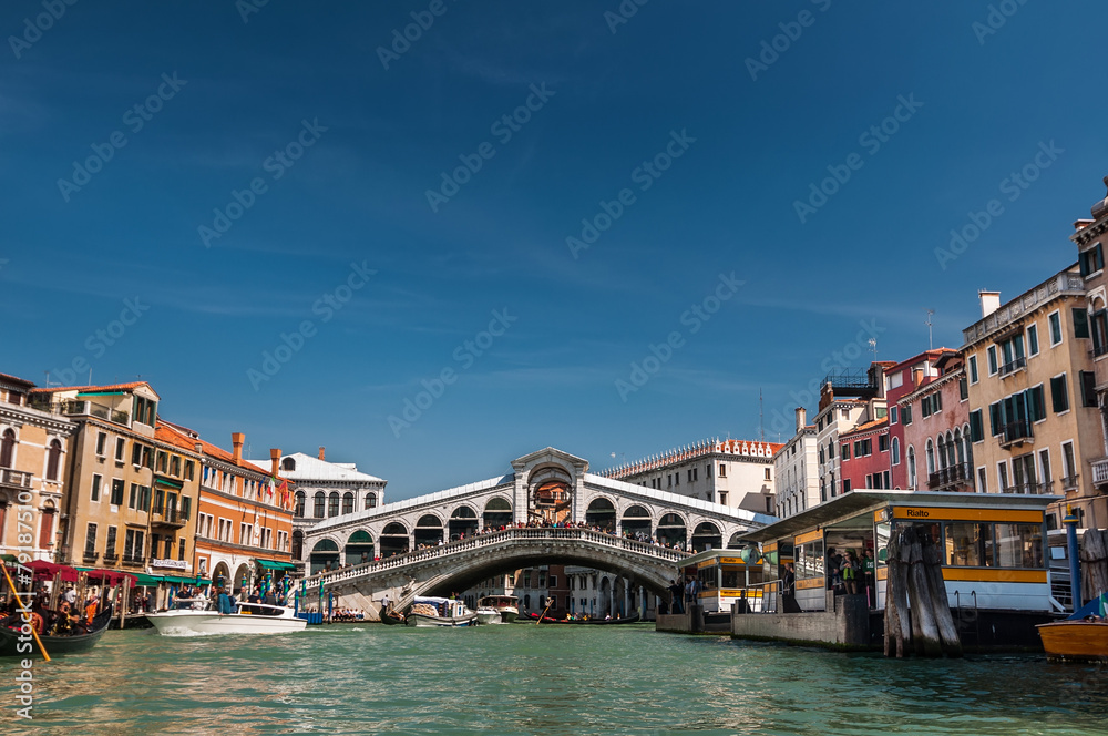 Rialto bridge and boats on Grand Canal, Venice, Italy