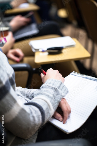 Making notes in a classroom