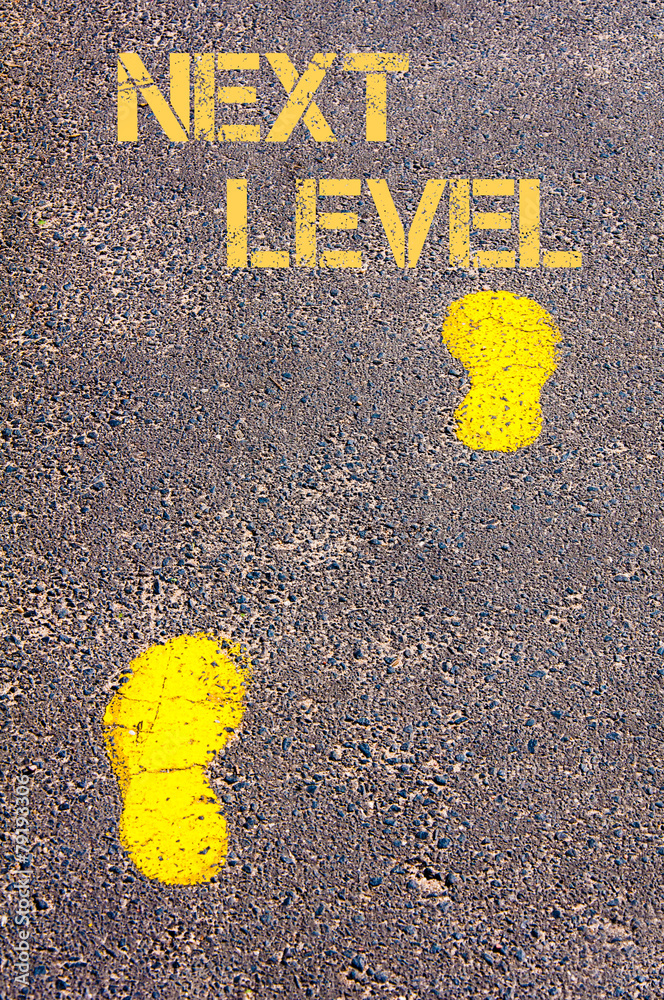 Yellow footsteps on sidewalk towards Next Level message