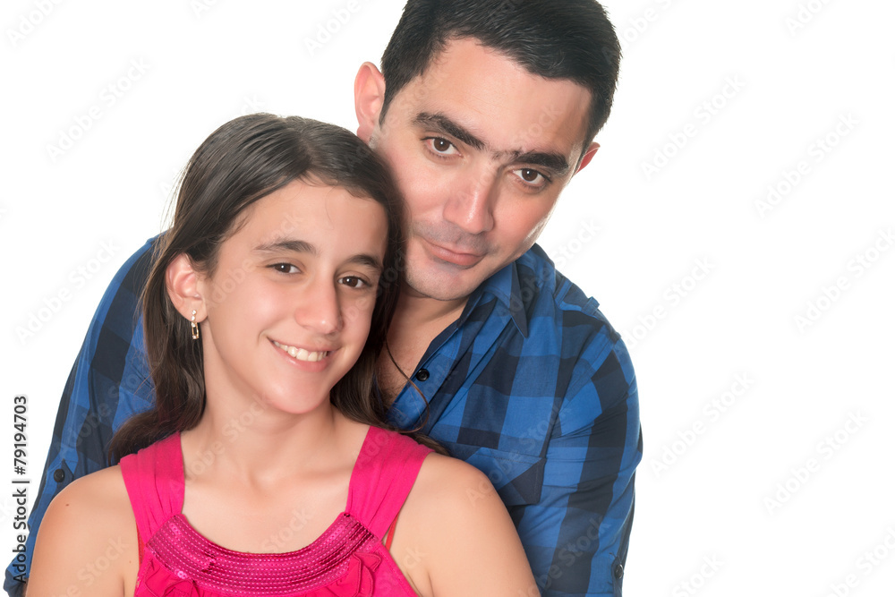 Hispanic man hugging her teenage daughter