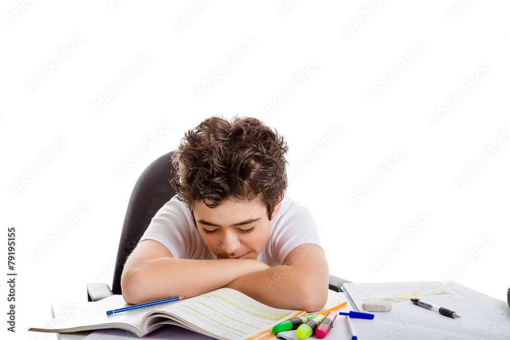 Tired boy doing homework Tired boy doing homework