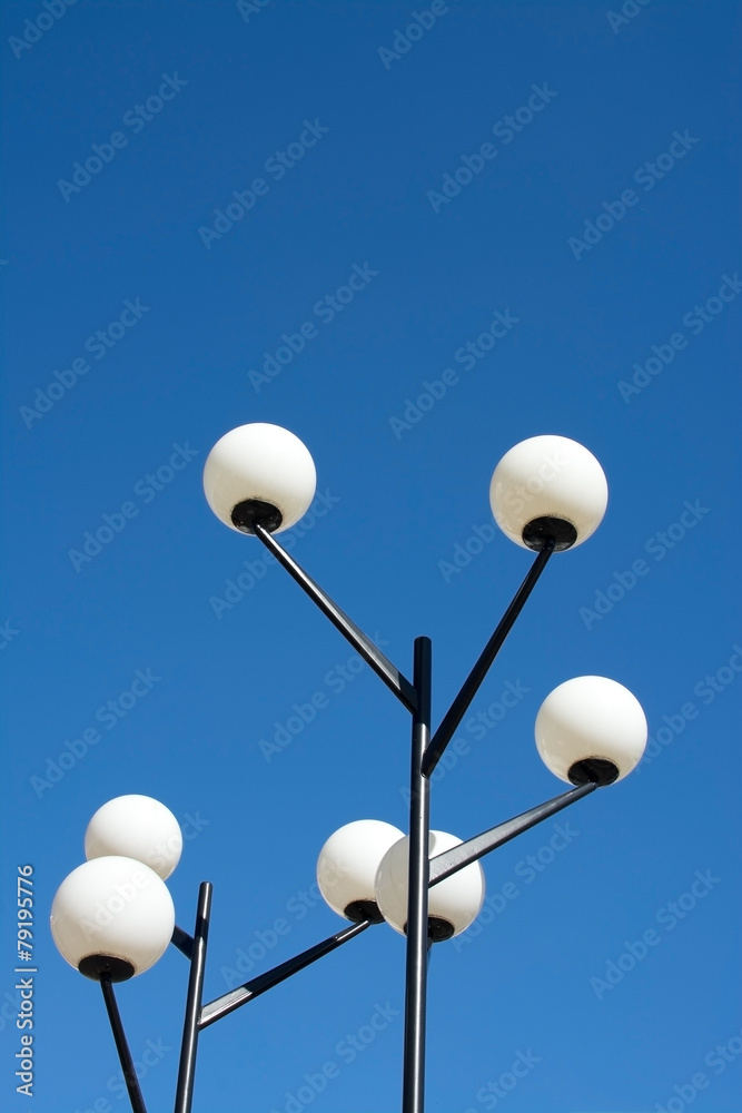 Round fifties lamps with white glass globes Vallingby, Sweden. Round fifties lamps with white glass globes Vallingby, Sweden.