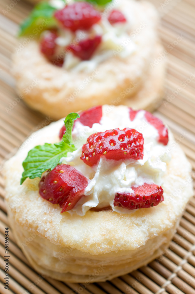 Baked strawberry dessert with cream. Sweet strawberry tart Baked strawberry dessert with cream. Sweet strawberry tart