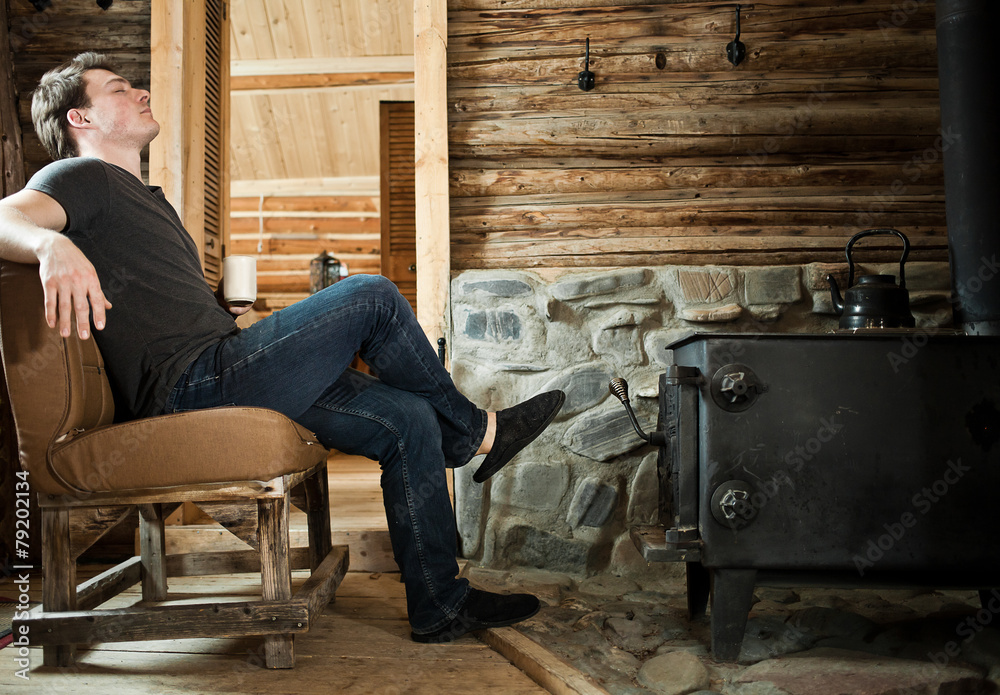 Lonely Man Relaxing with Slippers and Cup of Coffee. Lonely Man Relaxing with Slippers and Cup of Coffee.
