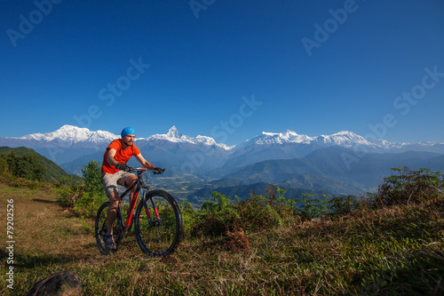 Biker-boy in Himalaya mountains, Anapurna region © Maygutyak