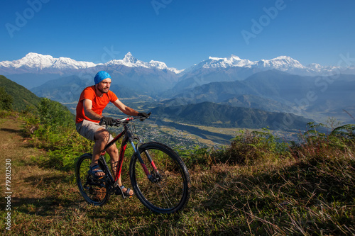 Biker-boy in Himalaya mountains  Anapurna region