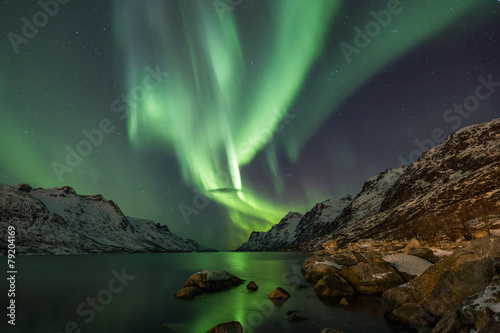 Incredible Aurora Borealis over night sky in Arctic photo