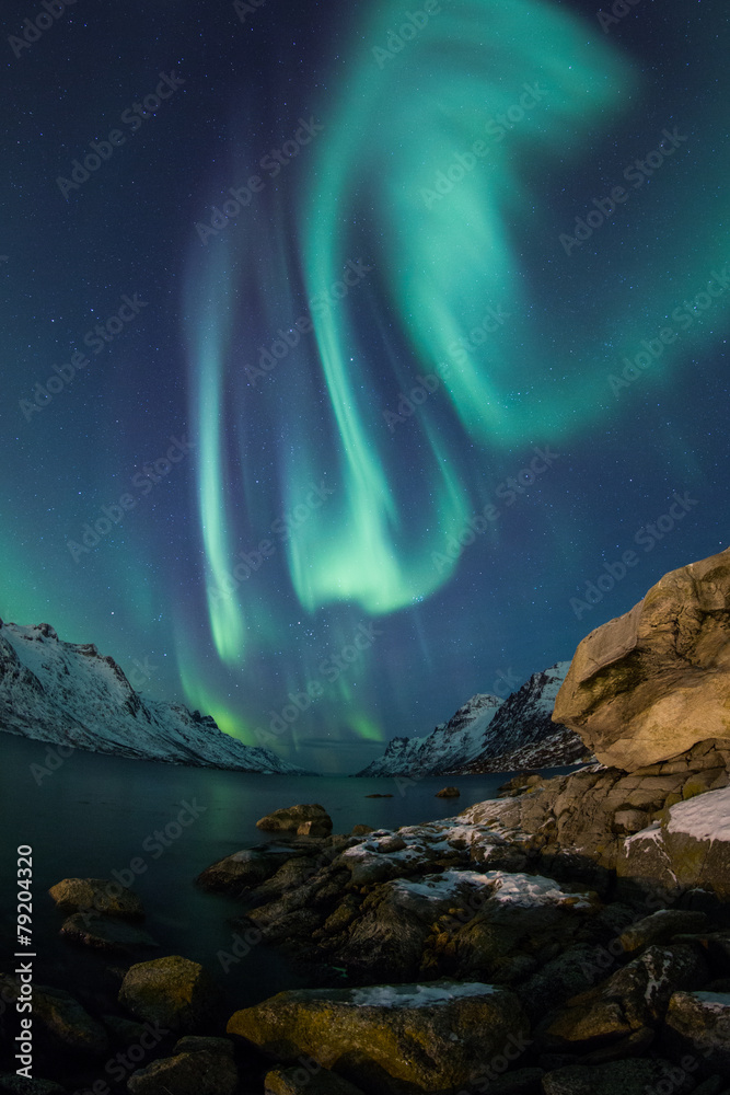 Incredible Aurora Borealis over night sky in Arctic