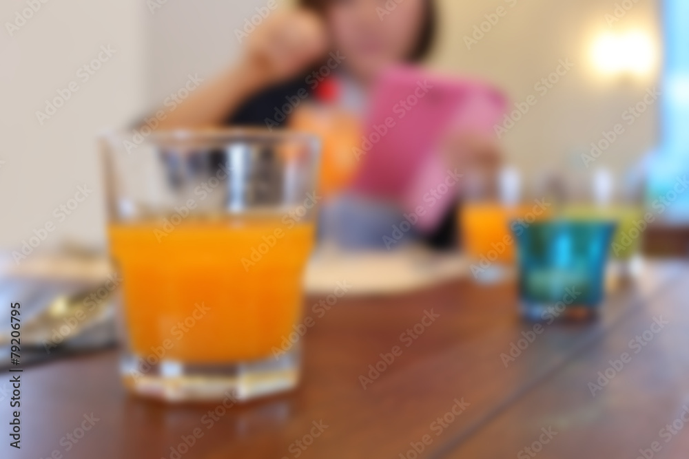 Glass of orange juice.