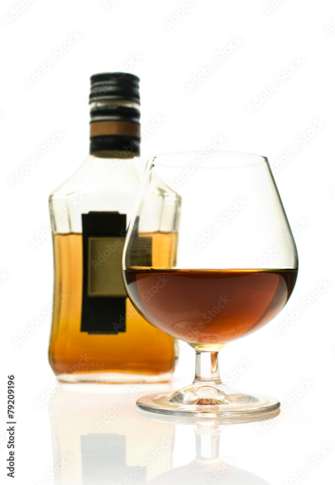 Bottle of brandy and a glass Bottle of brandy and a glass