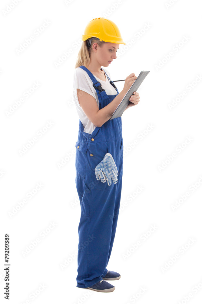 woman in blue builder uniform writing something on clipboard iso woman in blue builder uniform writing something on clipboard iso
