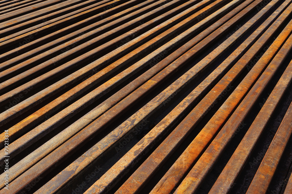 red and brown rusted railway steel.