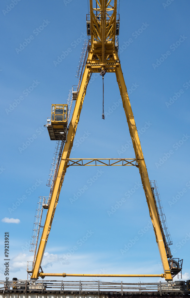 Gantry crane against the blue sky Gantry crane against the blue sky