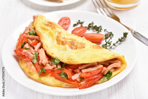 Omelette with vegetables and ham