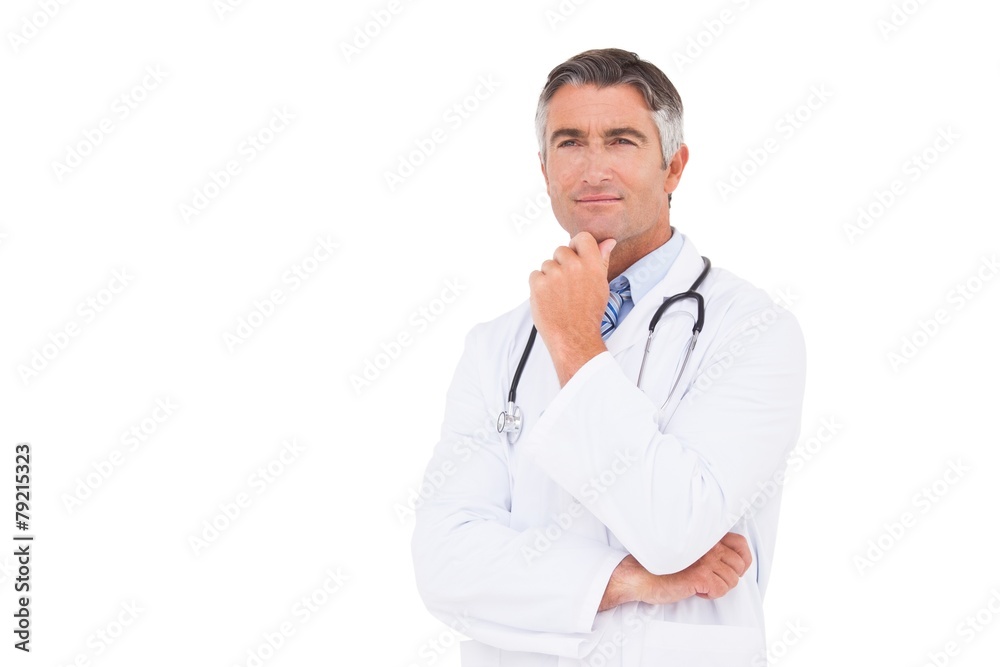 Doctor thinking with hand on chin Doctor thinking with hand on chin