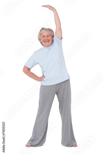 Senior woman stretching her arms