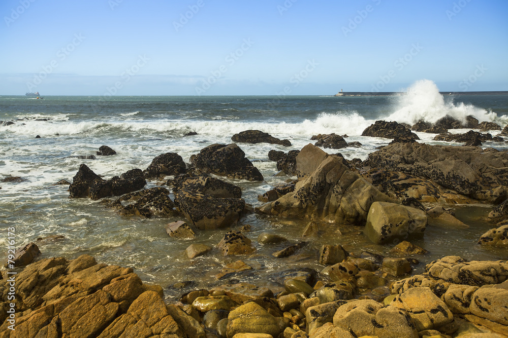 Surf at rocky ocean coast. Atlantic ocean, Portugal.