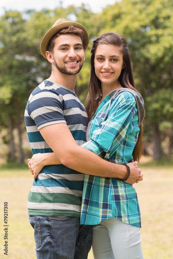 Young couple smiling at camera Young couple smiling at camera