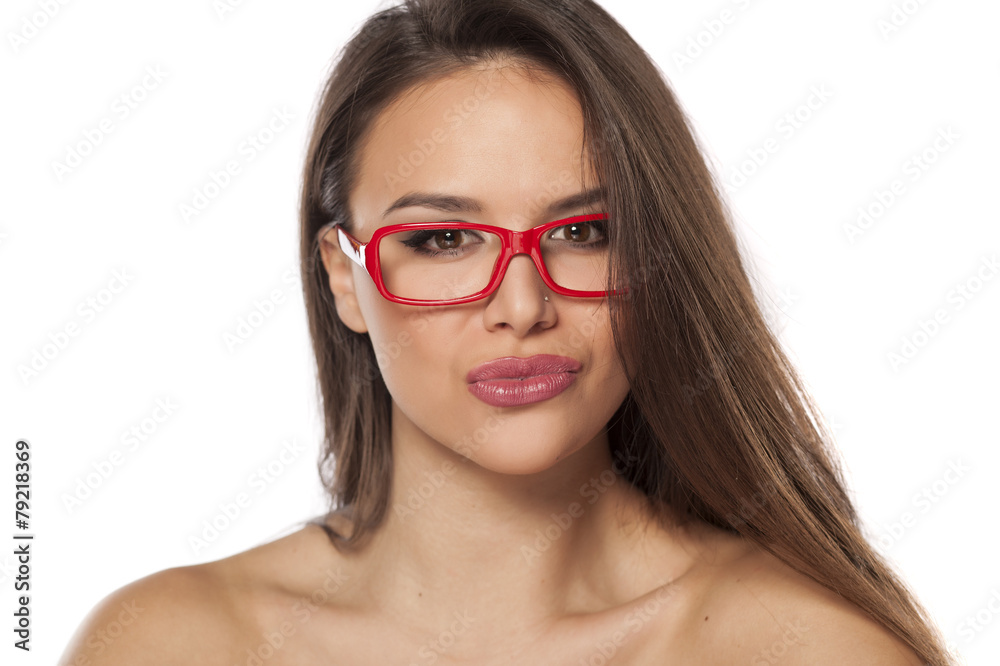 pretty young woman with glasses posing on a white background pretty young woman with glasses posing on a white background