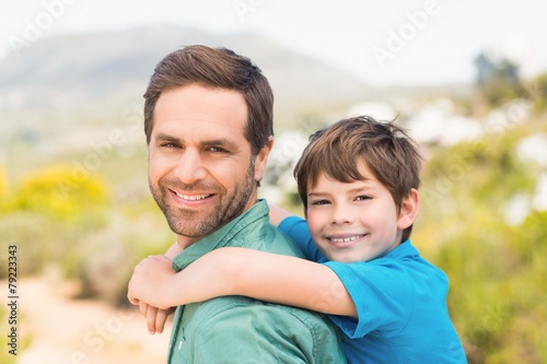 Father and son hiking through mountains © WavebreakMediaMicro