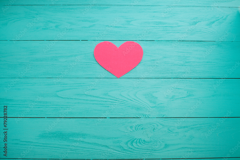 Paper heart on blue wooden background. Top view Paper heart on blue wooden background. Top view