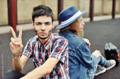 Fashion portrait of hipsters couple outdoor