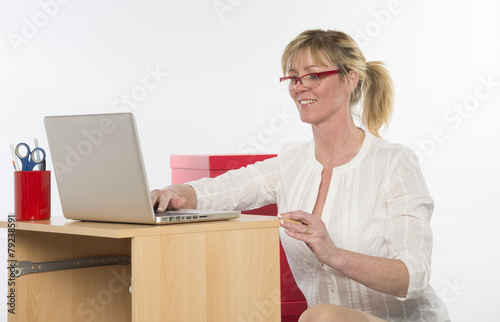 Sexy secretary working at desk