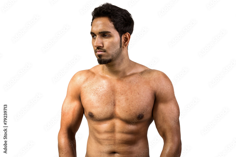 A young and fit male model posing his muscles A young and fit male model posing his muscles