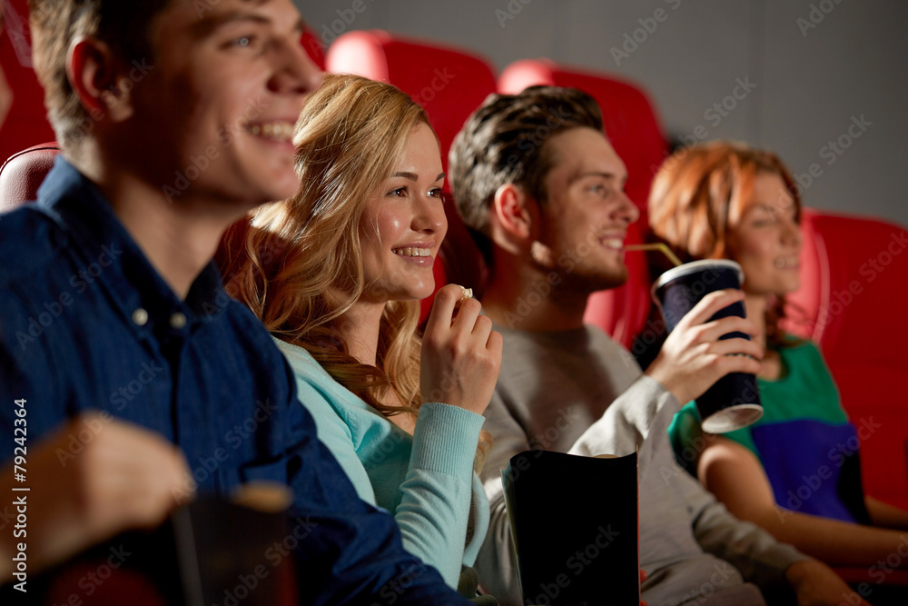 happy friends watching movie in theater happy friends watching movie in theater