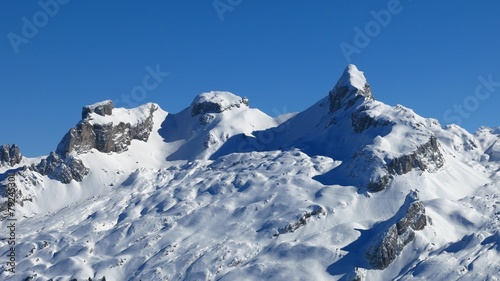 Snow covered mountains Chaiserstock and Chronenstock