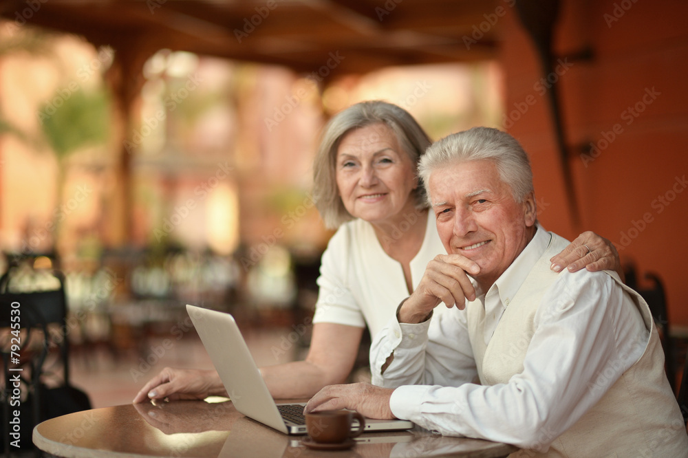 couple sitting with laptop couple sitting with laptop