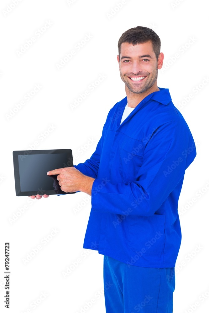 Mechanic pointing on digital tablet on white background Mechanic pointing on digital tablet on white background