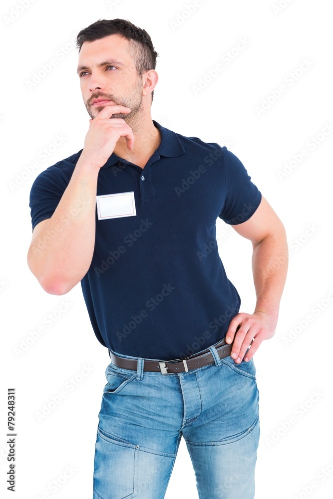 Technician with hand on chin looking up Technician with hand on chin looking up