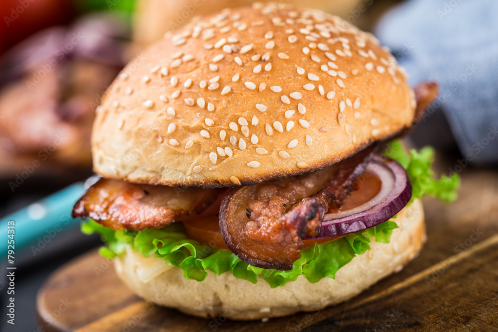 Home made burger on wooden board